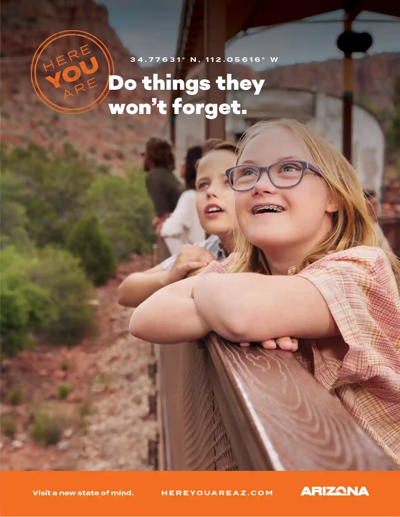 A young girl with glasses and braces leans on a wooden railing, smiling and looking into the distance. Behind her, another child and adults enjoy the scenic view of red rock cliffs and greenery. The text overlay reads, "Do things they won't forget," accompanied by coordinates "34.77631° N, 112.05616° W" and the slogan "Here You Are." The bottom banner features the Arizona tourism logo, the tagline "Visit a new state of mind," and the website "HereYouAreAZ.com.