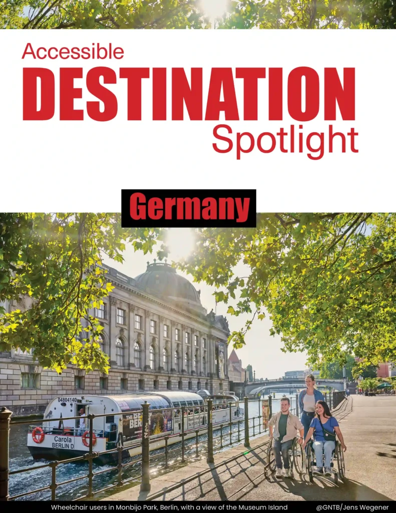 A promotional cover image for 'Accessible Destination Spotlight: Germany.' The top portion of the image features bold red and black text on a white background. Below, a scenic view of Monbijou Park in Berlin is shown, with the Bode Museum and Museum Island in the background. A riverboat named 'Carola Berlin D' is cruising along the water. In the foreground, three people, including two wheelchair users, are enjoying a paved riverside path shaded by green trees. Sunlight filters through the leaves, casting a warm glow on the scene. A caption at the bottom reads, 'Wheelchair users in Monbijou Park, Berlin, with a view of the Museum Island.' Photo credit: @GNTB/Jens Wegener