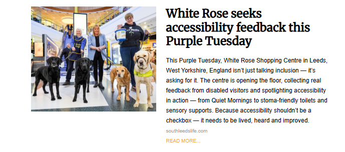 Group of people with three service dogs inside the White Rose Shopping Centre collecting feedback for Purple Tuesday accessibility and inclusion.