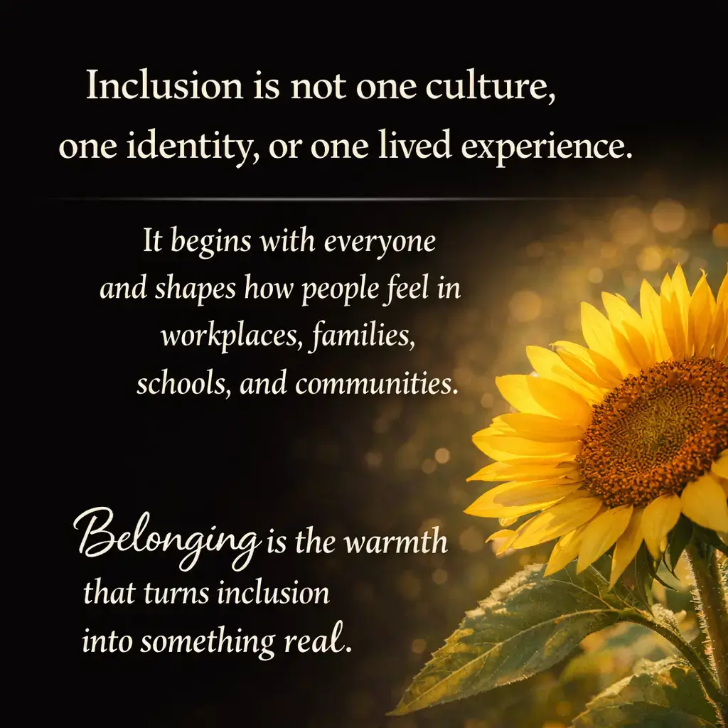 A graphic on a dark, sparkling background featuring a bright sunflower in the bottom right corner. The text states: "Inclusion is not one culture, one identity, or one lived experience. It begins with everyone and shapes how people feel in workplaces, families, schools, and communities. Belonging is the warmth that turns inclusion into something real."