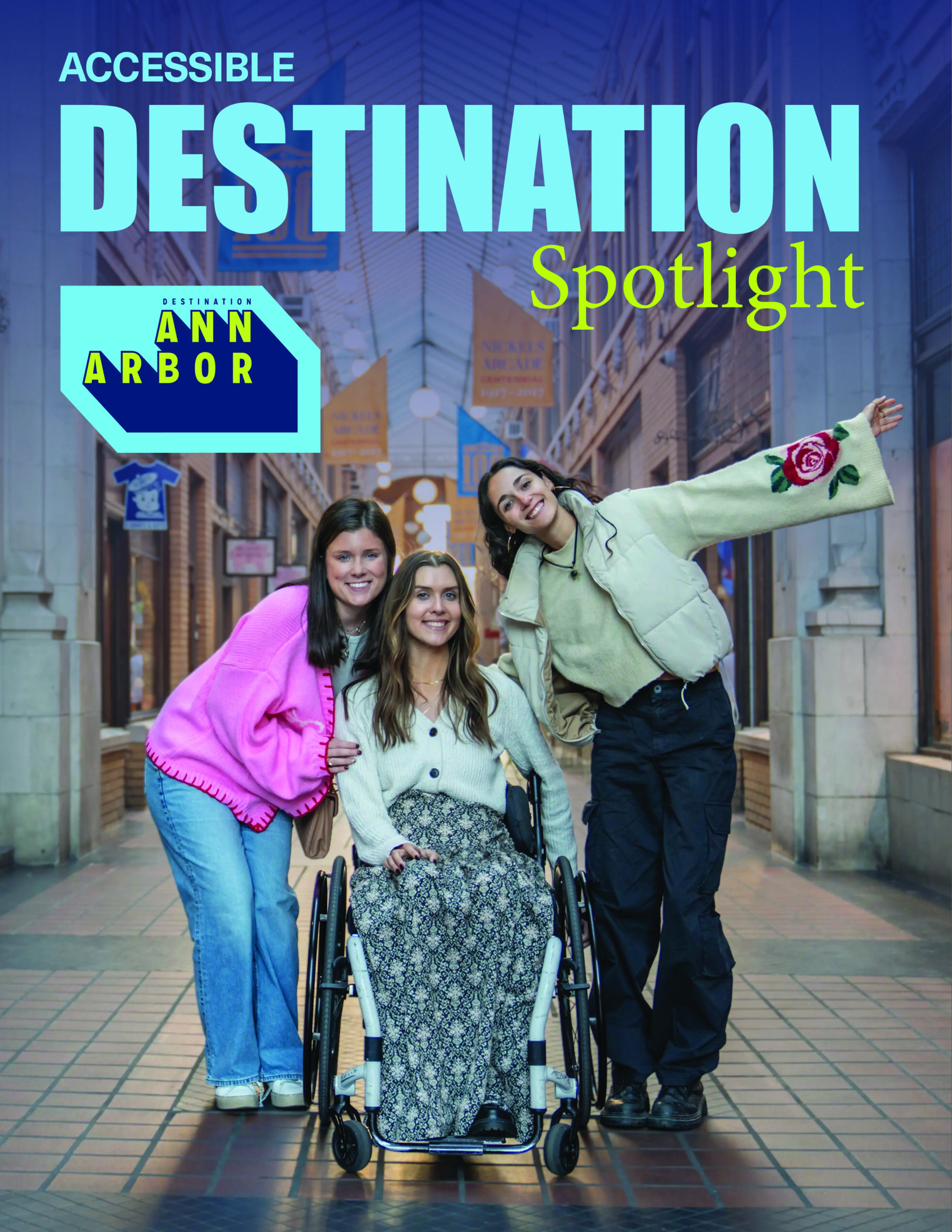 Accessible Destination Spotlight Ann Arbor cover featuring three young women in an indoor arcade; one woman uses a wheelchair while two friends stand beside her, smiling. Bold headline text reads “Accessible Destination Spotlight” with Destination Ann Arbor logo, highlighting inclusive travel experiences.
