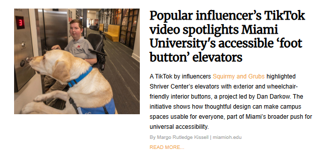 A news highlight about Miami University’s accessible "foot button" elevators. The image shows a man in a power wheelchair and a golden retriever service dog. The dog is using its nose to press a large, circular accessibility button on the wall next to the elevator.