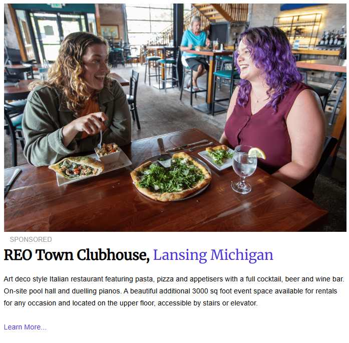 Two women laughing over a meal of pizza and flatbread at the REO Town Clubhouse, an Art Deco style Italian restaurant and event space in Lansing, Michigan.