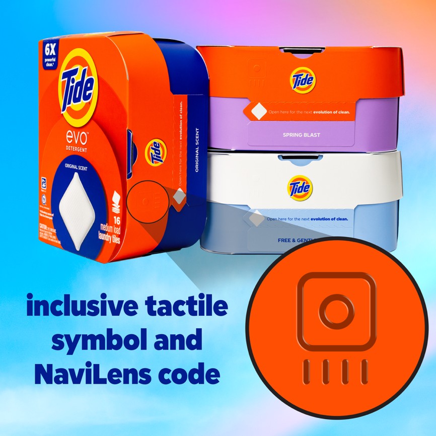 Promotional image of Tide Evo detergent packaging in bright orange, blue and pastel colours. The image shows multiple detergent boxes, including Original Scent, Spring Blast and Free & Gentle varieties. A large orange tactile accessibility symbol is displayed in the foreground, representing inclusive tactile markings and NaviLens integration for accessibility. Bold blue text reads: “inclusive tactile symbol and NaviLens code