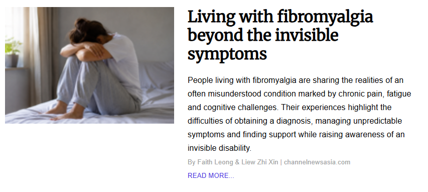 Image titled "Living with fibromyalgia beyond the invisible symptoms" displaying a person sitting on a bed with their knees pulled up to their chest and their head resting on their arms, conveying exhaustion or pain.